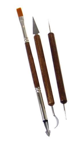 A set of 3 double-sided tools - a brush